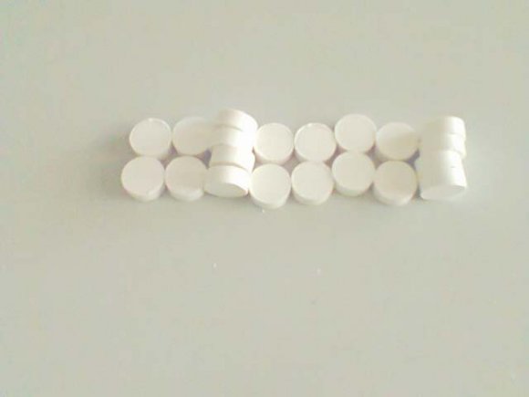 ................................................................... (8) Compact density (?)= Weight of tablet Volume of tablet .................... (9) d. Compact Radial tensile strength 9