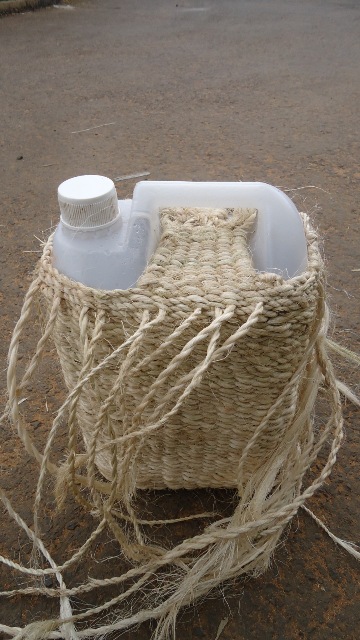 a) Quality of milk at producer (Olla) and terminal market Volume XIV Issue I Version I Year ( Having all the experimental containers the team was arrived at village (Olla) from where the sample was e) taken. The wrapped container just right wrapping was depicted in the picture below.