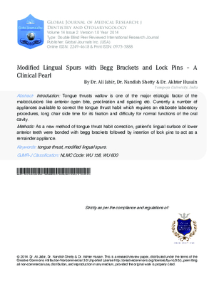 Modified Lingual Spurs with Begg Brackets and Lock Pins - A Clinical Pearl